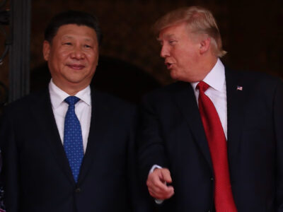 U.S. President Donald Trump talks with Chinese President Xi Jinping