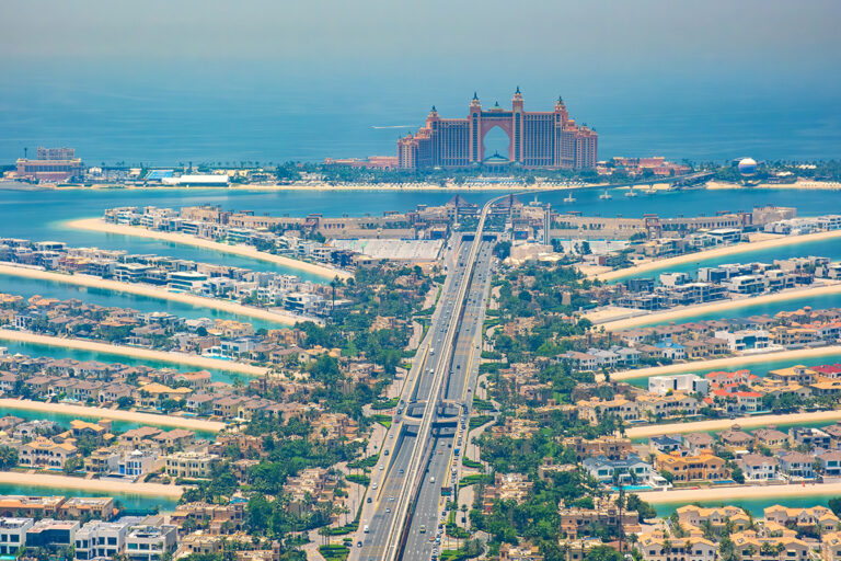 Aerial view of Dubai's Palm Jumeirah artificial island with luxury villas and Atlantis hotel