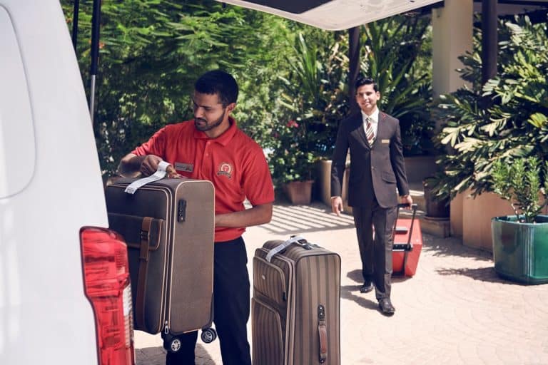 Emirates Dubai baggage luggage rain UAE